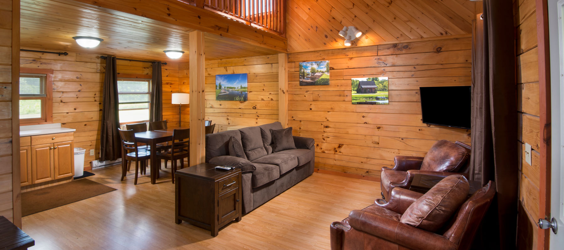 light wood cabin interior with brown leather seating